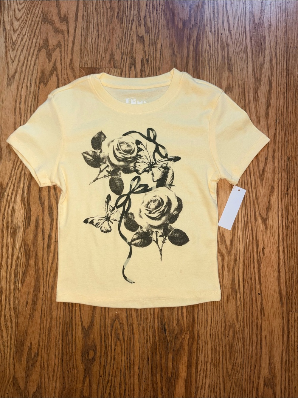 NWT Doe. Light Yellow Graphic Tee – Rose Butterfly Bow (XS 0/2)